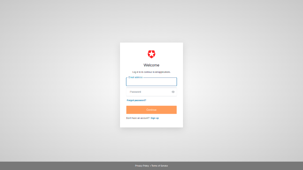 The login box is centered on the screen. You also have the footer informing the terms of use and the privacy policy.